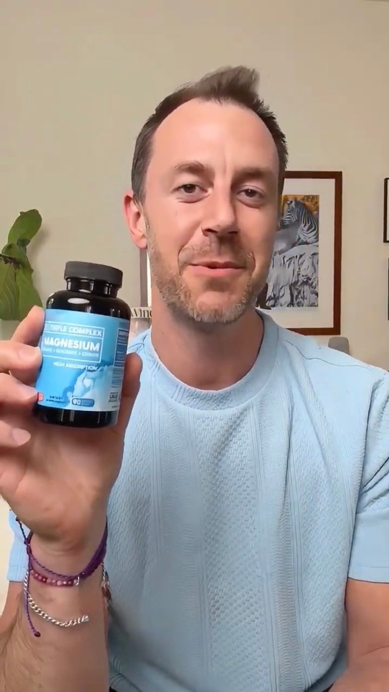 Customer holding a BioEmblem supplement